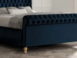 Aldwych Upholstered Sleigh Bed Only -Bedding Specialty Store aldwych velvet navy angled new fb close up 3